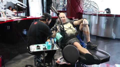 Man getting a tattoo.