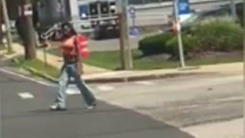 Long Island cop drives cruiser into woman waving gun in the street