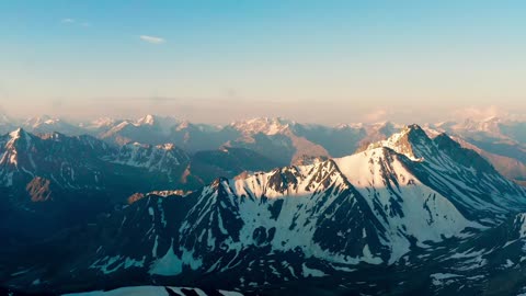 It's so heartwarming to be photographing such majestic mountains from a helicopter