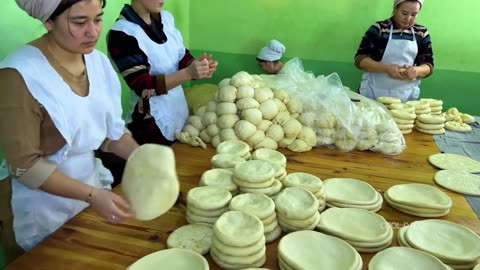 "Tandoor Spectacle: Crafting 5000 Flatbreads Daily in 8 Tandoors - A Fiery Feast of Uzbek Cuisine!"