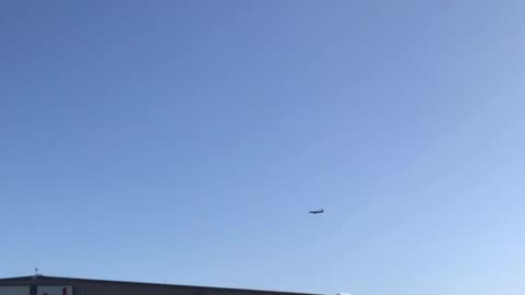 Trump 3-25-23 Waco rally-Trump plane circling above crowd at venue before landing