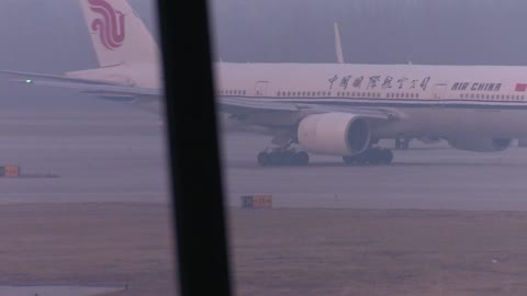 Beijing airports drop need for negative Covid test