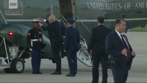 Trump stop to retrieve marine hat
