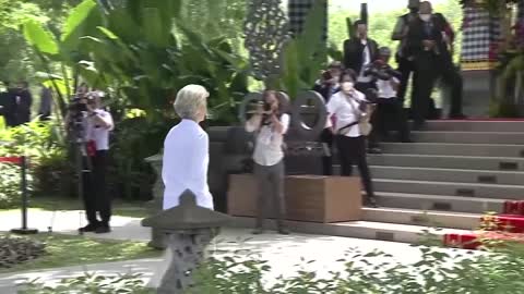 US President Joe Biden wearing dark Aviator Sunglasses joins global leaders at Hutan Mangrove Forest