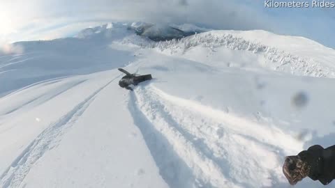 Belt Snap Sends Snowmobile Rider Over the Bars