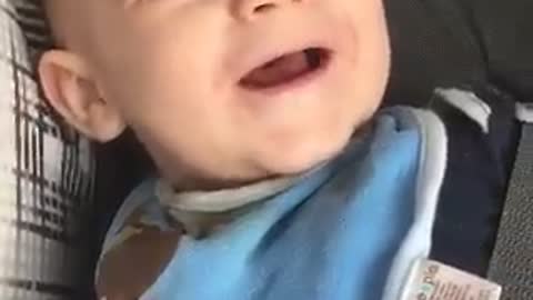 This baby's laughter is extremely contagious!