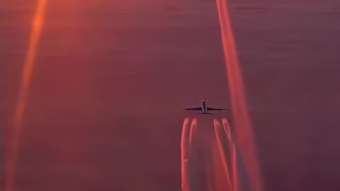 Cristal clear footage of a plane flying right under another plane