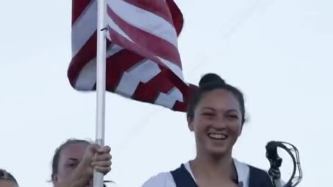 Navy women’s lacrosse team sings 'Courtesy of the red white and blue' by Toby Keith.