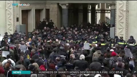 Brawl breaks out in Georgia's parliament over the "foreign agent" law being backed by ruling party.
