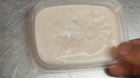 Closing A Garlic Sauce Cup