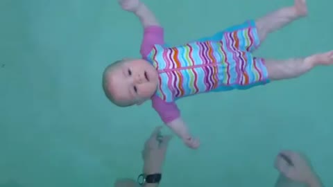 5 months old baby swimming, this baby can float really good