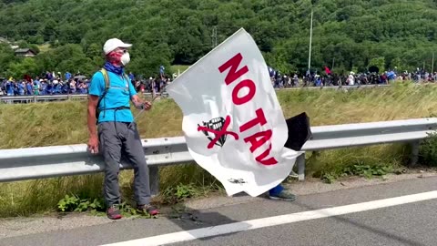 French police fire tear gas at rail link protest