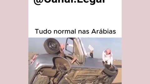 Arabs changing the tire on a moving car... you have to take a risk...