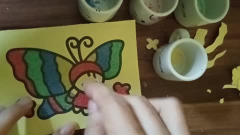 learn to color butterflies with sand