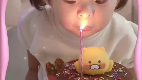 "Adorable Birthday Candle Fail: Funny Kid Moment!"