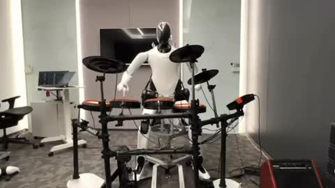 The humanoid robot CyberOne is playing a drum set without missing any beat