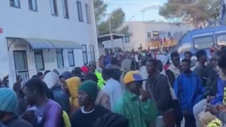 Italy, Lampedusa now. Look, they are only men!