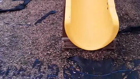 Man Flies Down Icy Slide