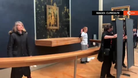 Climate protesters throw soup on Mona Lisa painting in the Louvre Museum, Paris