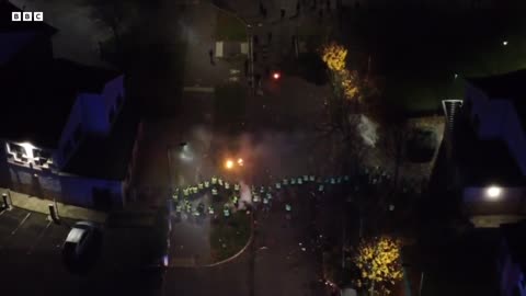 Drone video shows fireworks being fired at police