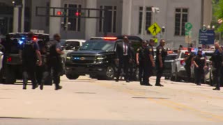 Miami police pull aside man in prison jumpsuit as Trump motorcade pulls up to courthouse