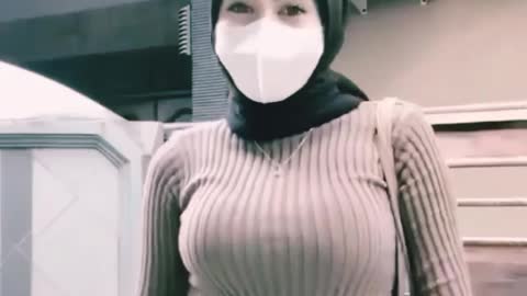 beautiful girl in hijab dancing