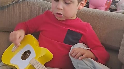 **4 year old shocks family with amazing guitar skills**