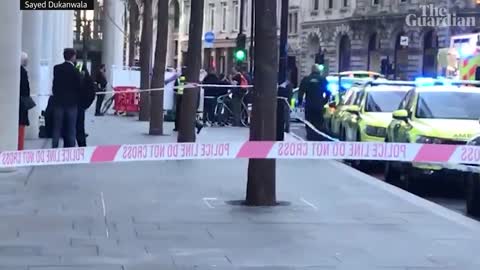 Police and paramedics attend scene of stabbing in central London