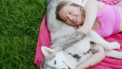 Women Petting her Lovely Dog.