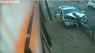 A police car crashed into a barrier in Oldham, Manchester.