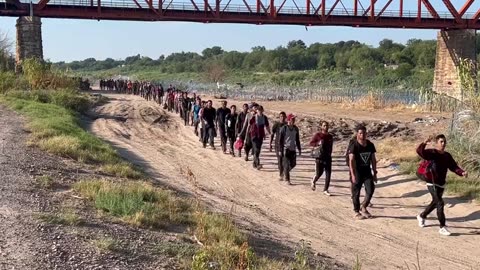 Mass illegal crossing of well over 1,000 migrants into Eagle Pass, TX
