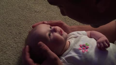 Baby girl has emotional reaction to daddy's singing