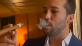Tristan Tate smokes a £1300 cigar