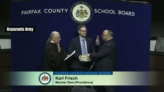 Fairfax County School Board Member Is Sworn In On A Stack of LGBTQ Themed Books