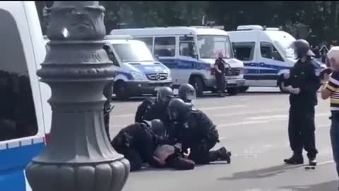 German Cops Punch Lady In The Back of The Neck While She's Down