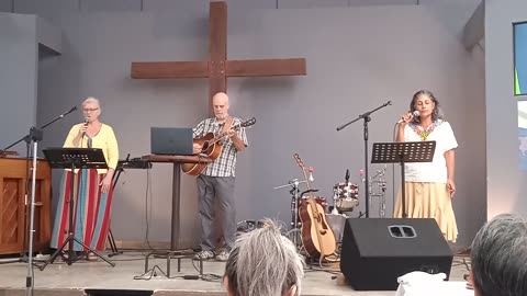 "In Christ Alone" sung by Marisol and Nicole, and the acoustic guitar played by Jim.