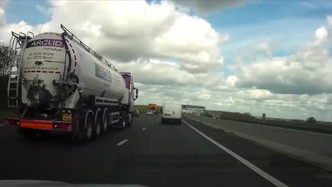 Truck Cuts off a Vehicle Forcing It to Change Lanes