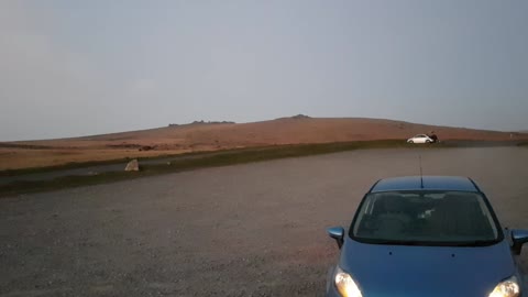 At Cox Tor carpark showing Brent Tor miles away. Sunset