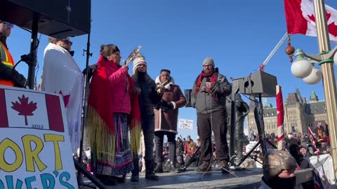 Clan mother Noreen from Yellowknife offers blessing to convoy.