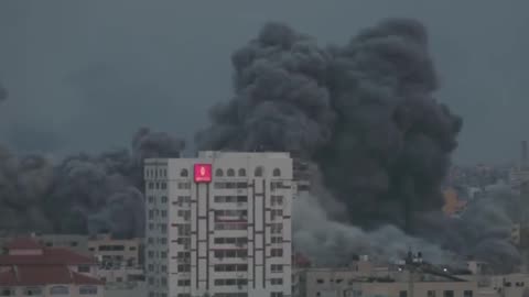 Video from Reuters Showing a Building Being Hit And Collapse in Gaza