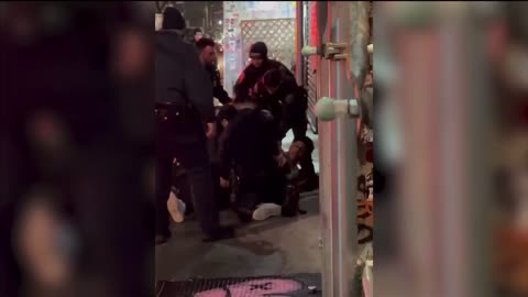 Ex-Lacrosse player 26 year old Shawndel Evans injures a NYC police officer as crowd cheers on