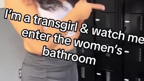 Trans man films himself dancing and smiling while he enters a women’s bathroom