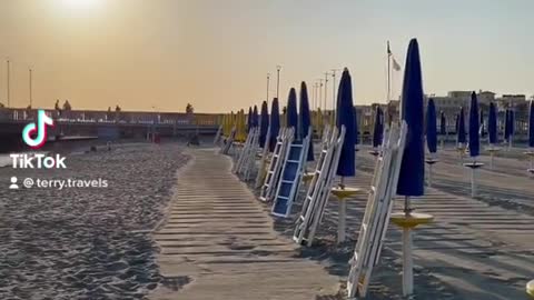 Enjoying calamari, prawns and sunset at the beach near Rome