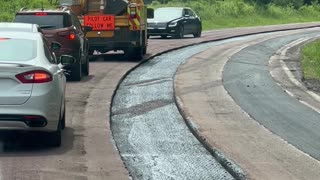 Car Reverses Through Construction Zone