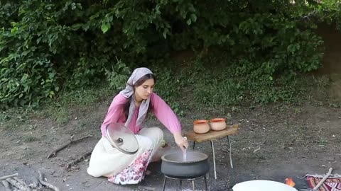 French cuisine delicious Atishi broth with local bread (Nan Sach)