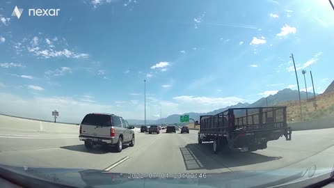 Truck Tire Pops off at an Unfortunate Time