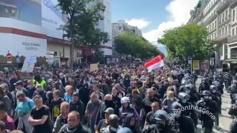 Peaceful Protests in Paris and packed against Macron's Tyrannical Covid Passports
