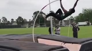 Slow motion pole vault jump