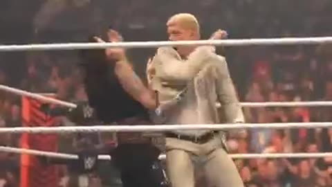 Cody Rhodes hit the CROSS RHODES on Dirty Dom in a SUIT