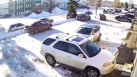 Driver in a BMW Trying To Leave A Carpark...